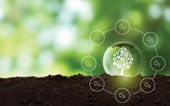 从泥土中长出的齿轮样树木图形